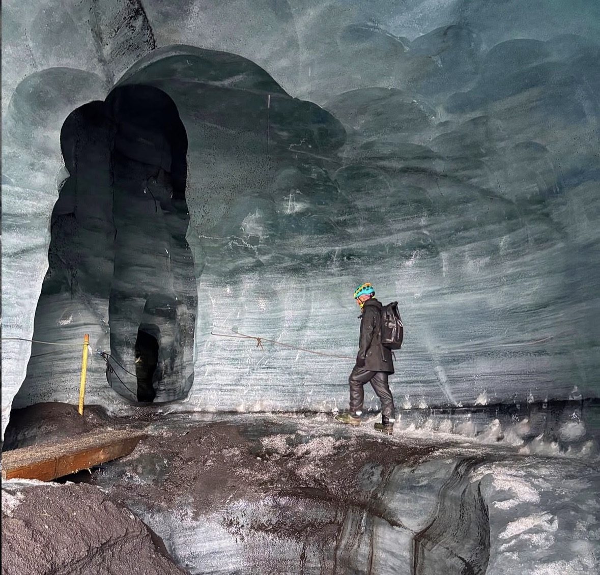 Mýrdalsjökull glacier under the Midnight Sun in summer, with visitors arriving for a Katla Ice Cave Tour in Iceland